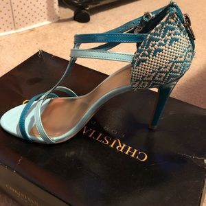 Turquoise buckle and zipper heels